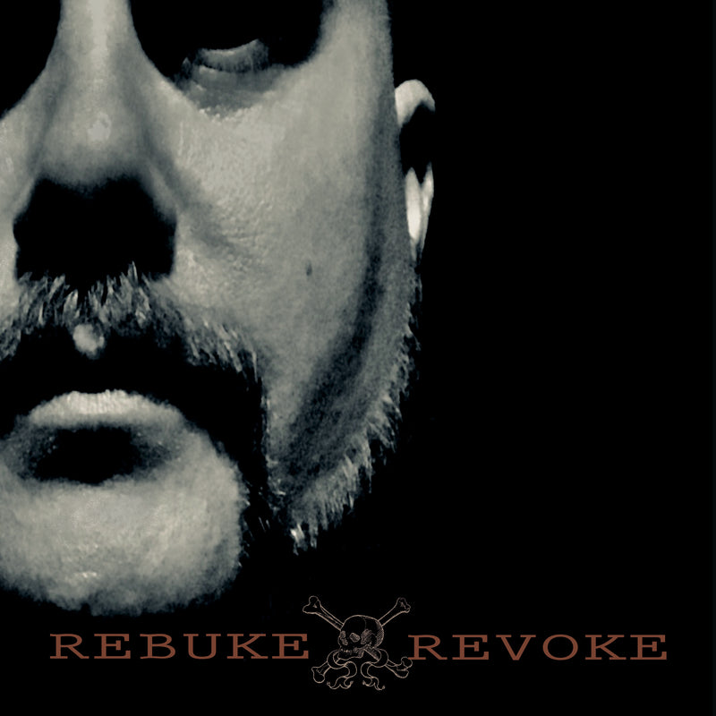 Rebuke Revoke cover art — a bearded face in close-up, desaturated green, with a skull-and-crossbones mark and the title in red